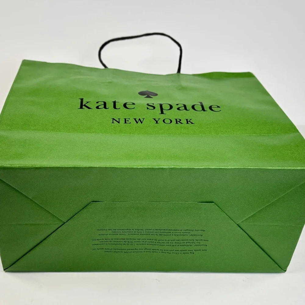 Kate Spade Pink box and green gift bag.